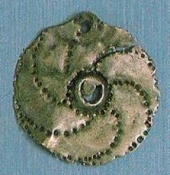 Antica ruota forata della cultura Vikinga. Ancient perforated wheel of the Viking culture. Antica ruota forata della cultura Vikinga. Ancient perforated wheel of the Viking culture.